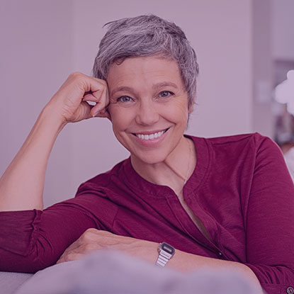 menopause happy senior woman on couch 2021 08 26 15 34 41 utc
